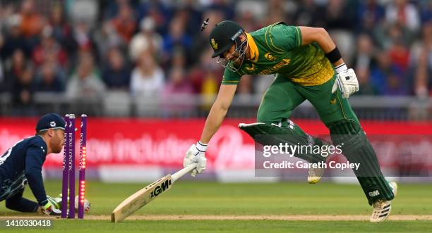 Aiden Markram of South Africa is run out by Jos Buttler of England during the 2nd Royal London Series One Day International match between England and...