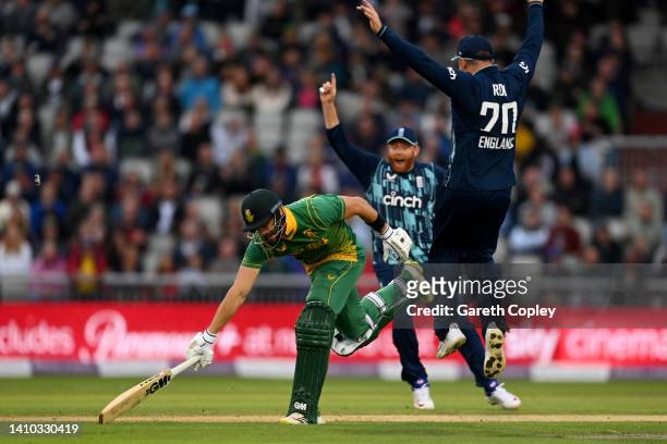 Aiden Markram of South Africa is run out by Jos Buttler of England during the 2nd Royal London Series One Day International match between England and...