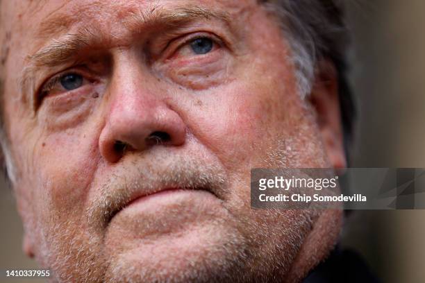 Former White House senior strategist Stephen Bannon talks to reporters as he leaves the Federal District Court House after being found guilty in his...