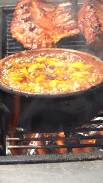 mango chutney and pork cooking over the fire