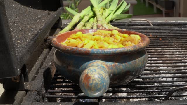 mango chutney  cooking over the fire