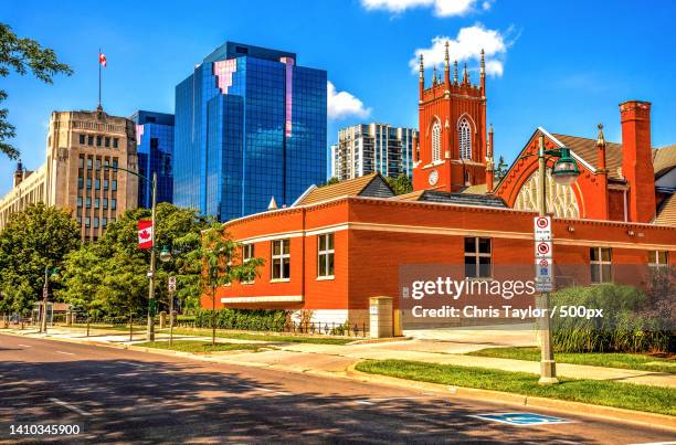 view of buildings against blue sky,london,ontario,canada - london ontario stock-fotos und bilder