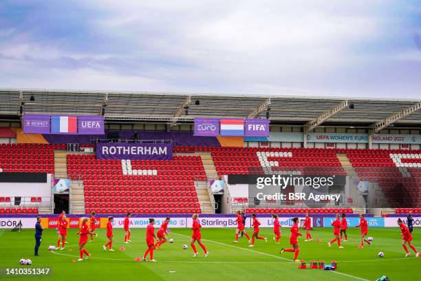 Players and flags of France and the Netherlands are seen during the training session prior to the Quarter Final - UEFA Women's EURO 2022 match...