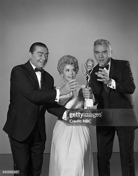 16th ANNUAL PRIMETIME EMMY AWARDS -- Pictured: Emmy hopefuls Ernest Borgnine, Donna Douglas, Lorne Greene in May 1964 -- Photo by: NBC/NBCU Photo Bank