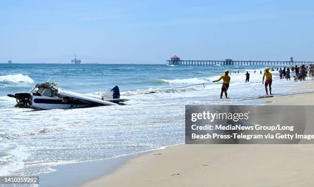 Huntington Beach, CA A pilot was extricated from a small plane after it crashed into the water off the coast of Huntington Beach Friday afternoon,...