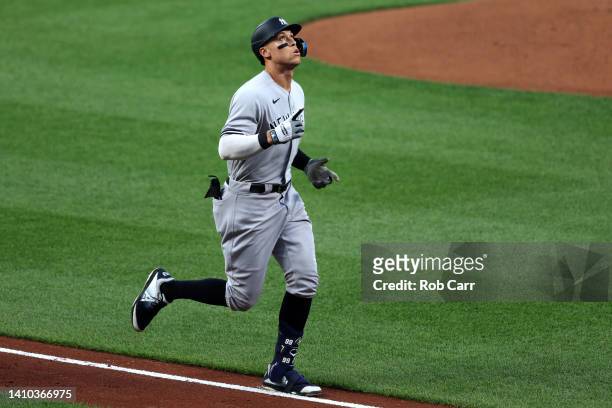 Aaron Judge of the New York Yankees celebrates after hitting a three RBI home run against the Baltimore Orioles in the third inning at Oriole Park at...