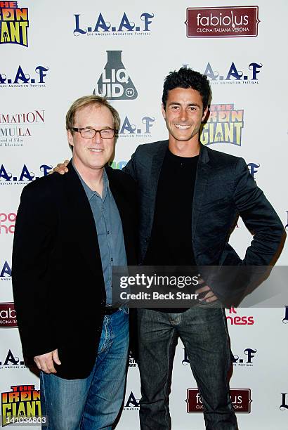 Director Brad Bird and actor Eli Marienthal arrive at 2012 Los Angeles Animation Film Festival - "The Iron Giant" charity screening at Regent...