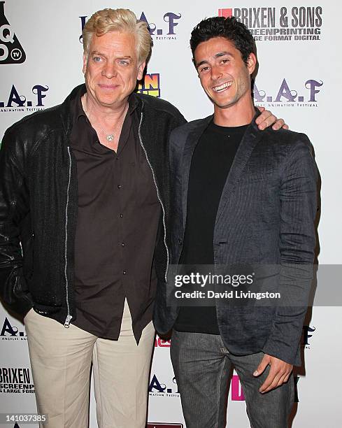 Actors Christopher McDonald and Eli Marienthal attend the 2012 Los Angeles Animation Film Festival charity screening of "The Iron Giant" at Regent...
