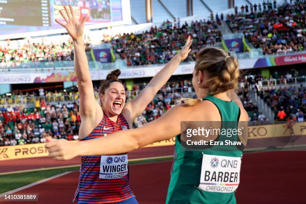 Kara Winger of Team United States and Kelsey-Lee Barber of Team Australia react after competing in the Women's Javelin Final on day eight of the...