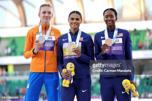 Silver medalist Femke Bol of Team Netherlands, gold medalist Sydney McLaughlin of Team United States and bronze medalist Dalilah Muhammad of Team...