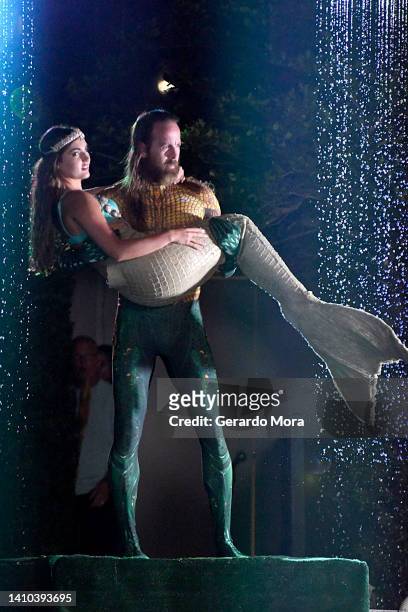 Faith Lynn and Brandon Yates perform, as the characters International Mermaid and Triton, at Orlando Swim Week produced by hiTechMODA on July 22,...