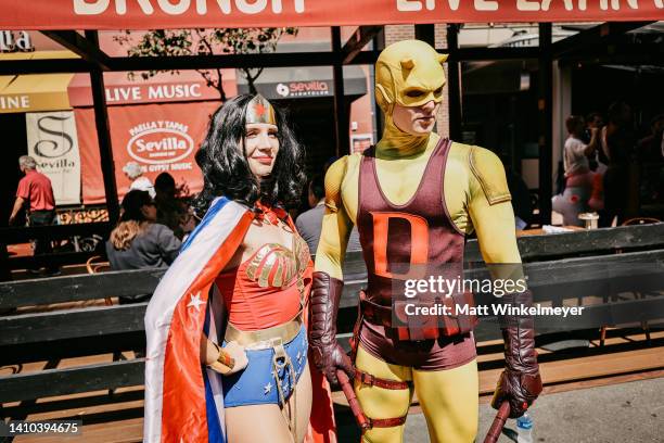 Cosplayers dressed as Wonder Woman and Daredevil attend 2022 Comic-Con International: San Diego on July 22, 2022 in San Diego, California.