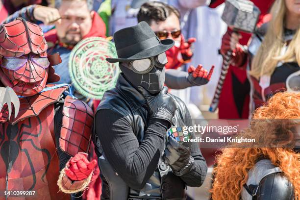 Group of Marvel cosplayers pose for photos at 2022 Comic-Con International Day 2 at San Diego Convention Center on July 22, 2022 in San Diego,...