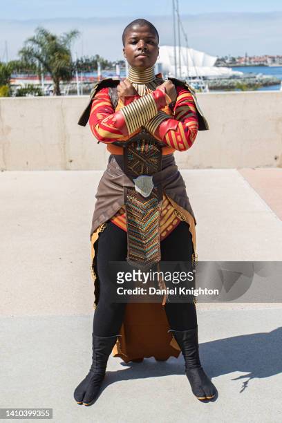 Black Panther cosplayer Stephanie Johnson as General Okoye poses for photos at 2022 Comic-Con International Day 2 at San Diego Convention Center on...