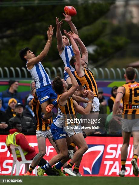 Cameron Zurhaar of the Kangaroos competes for the ball during the round 19 AFL match between the North Melbourne Kangaroos and the Hawthorn Hawks at...