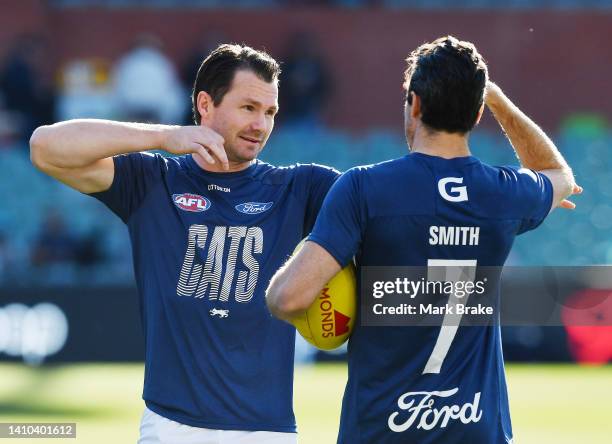 Patrick Dangerfield of the Cats chats to Isaac Smith of the Cats during wuothe round 19 AFL match between the Port Adelaide Power and the Geelong...