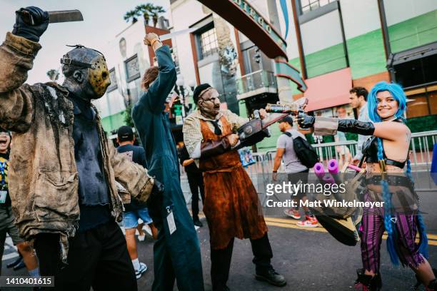 Cosplayer dressed as Jason, Michael Myers, and Leatherace attend 2022 Comic-Con International: San Diego on July 22, 2022 in San Diego, California.