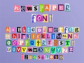 Colorful letters of font in newspaper style