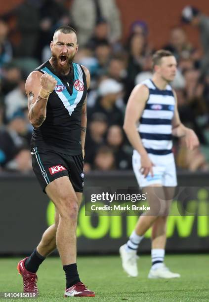 Charlie Dixon of Port Adelaide celebrates a goal during the round 19 AFL match between the Port Adelaide Power and the Geelong Cats at Adelaide Oval...