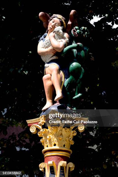 high section of sculpture of fontaine de l'ange at old town of biel, switzerland - briel foto e immagini stock