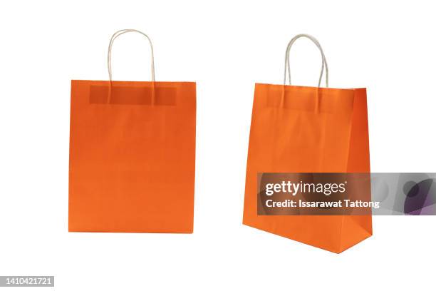 orange paper bag isolated on white background - reusable bag isolated stock pictures, royalty-free photos & images
