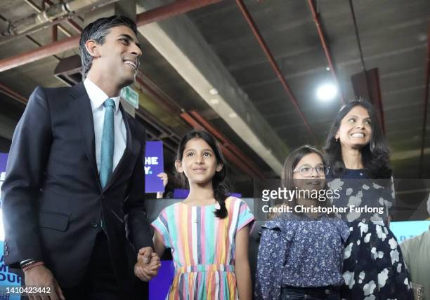 Conservative Leadership hopeful Rishi Sunak with daughters Krisna, Anoushka and wife Akshata Murthy ahead of a speech while campaigning on July 23,...