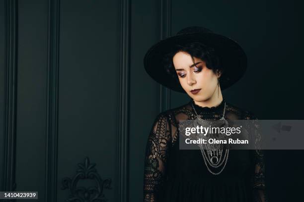 young tender woman in black vintage clothes. - sheer fabric stock pictures, royalty-free photos & images