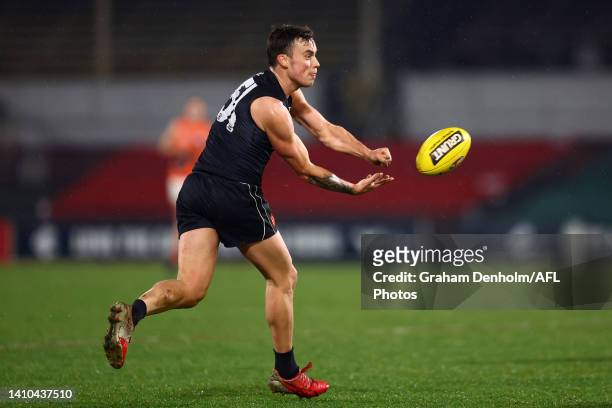 Tom North of Carlton handballs during the round 18 VFL match between Carlton Blues and GWS Giants at Ikon Park on July 23, 2022 in Melbourne,...