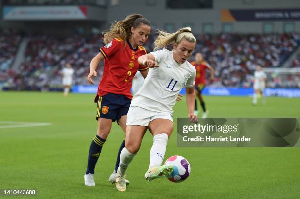 Lauren Hemp of England is challenged by Ona Batlle of Spain during the UEFA Women's Euro England 2022 Quarter Final match between England and Spain...