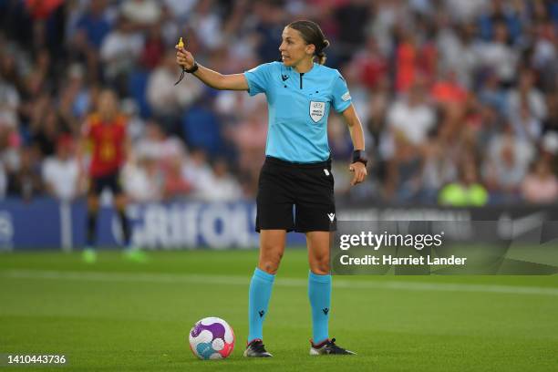 Referee Stephanie Frappart gives instructions during the UEFA Women's Euro England 2022 Quarter Final match between England and Spain at Brighton &...