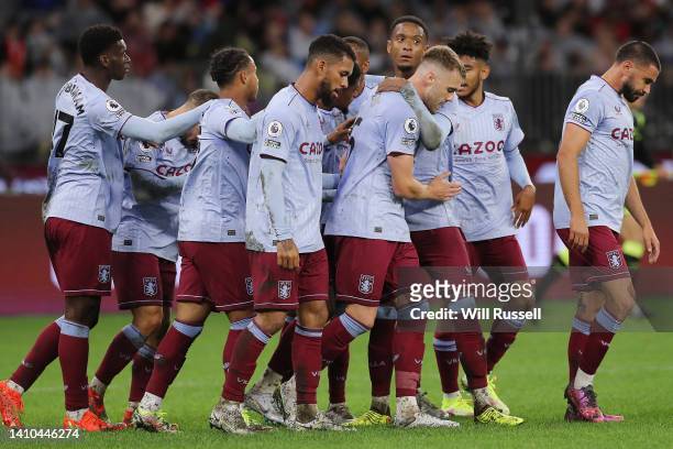 Calum Chambers of Aston Villa celebrates with team mates after scoring a goal during the Pre-Season Friendly match between Manchester United and...