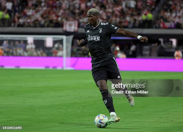 Paul Pogba of Juventus dribbles the ball up the pitch against Chivas during their preseason friendly match at Allegiant Stadium on July 22, 2022 in...