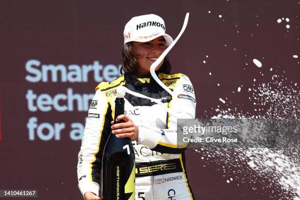 Race winner Jamie Chadwick of Great Britain and Jenner Racing celebrates on the podium during the W Series Round 4 race at Circuit Paul Ricard on...