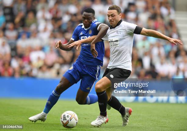 Patson Daka of Leicester City challenges James Chester of Derby County during the Pre-Season Friendly match between Derby County and Leicester City...