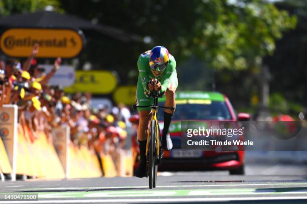 Wout Van Aert of Belgium and Team Jumbo - Visma - Green Points Jersey crosses the finish line during the 109th Tour de France 2022, Stage 20 a 40,7km...