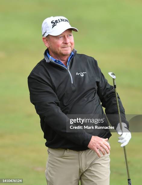 Kent Jones of United States plays his second shot at the 1st hole during Day Three of The Senior Open Presented by Rolex at The King's Course at...