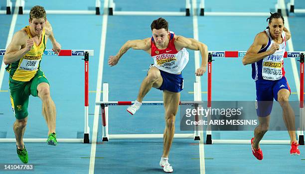 South Africa's Lehann Fourie , Russia's Konstantin Shabanov and France's Pascal Martinot-Lagarde compete in the men's 60m hurdles qualifications at...