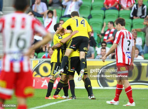 Paul Ifill of the Phoenix celebrates his goal wit teammates during the round 23 A-League match between the Melbourne Heart and the Wellington Phoenix...