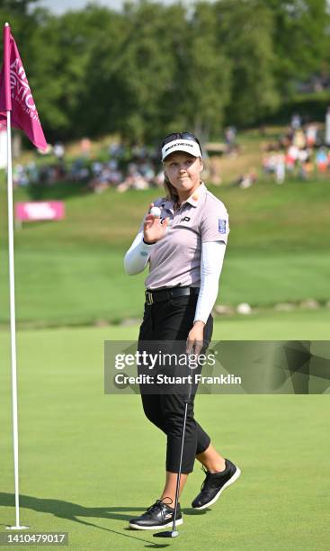 Brooke Henderson of Canada waves her golf ball on the 18th hole during day three of The Amundi Evian Championship at Evian Resort Golf Club on July...