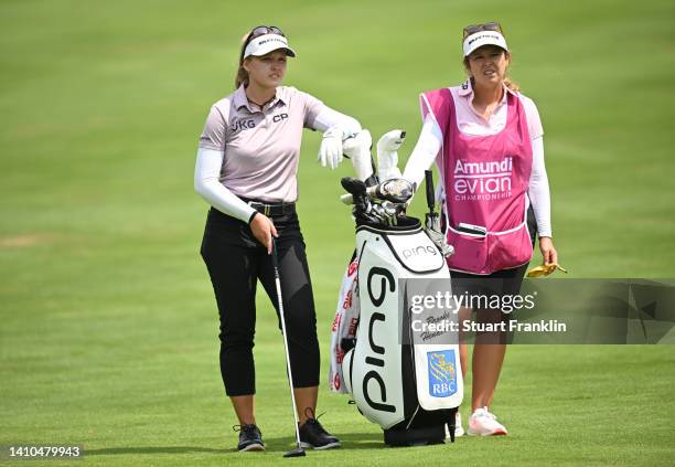 Brooke Henderson of Canada and caddie wait during day three of The Amundi Evian Championship at Evian Resort Golf Club on July 23, 2022 in...