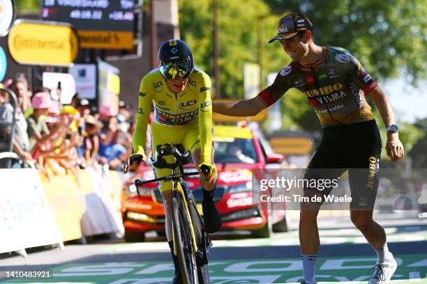 Jonas Vingegaard Rasmussen of Denmark and Team Jumbo - Visma - Yellow Leader Jersey crosses the finish line and celebrates as final overall winner...