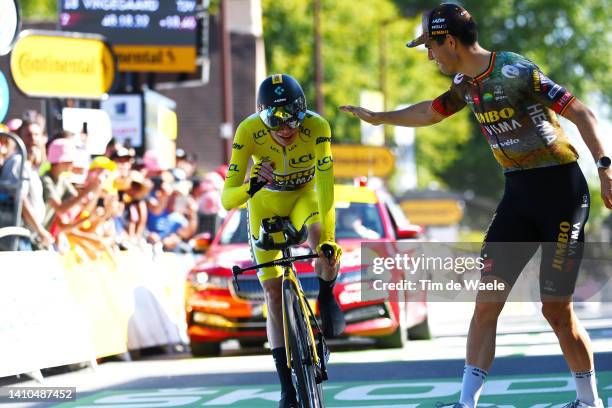 Jonas Vingegaard Rasmussen of Denmark and Team Jumbo - Visma - Yellow Leader Jersey crosses the finish line and celebrates as final overall winner...