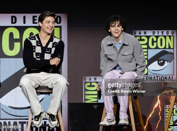 Asher Angel and Jack Dylan Grazer speak onstage at the Warner Bros. Theatrical session with "Black Adam" and "Shazam: Fury of the Gods" panel during...