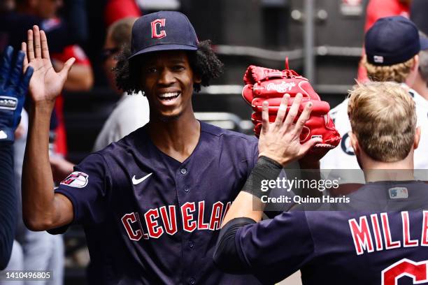 Starting pitcher Cal Quantrill of the Cleveland Guardians celebrates in the dugout with teammates in the third inning against the Chicago White Sox...
