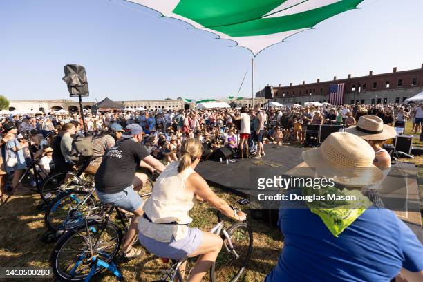 Langhorne Slim performs on a stage powered by bicycles during the 2022 Newport Folk Festival at Fort Adams State Park on July 22, 2022 in Newport,...