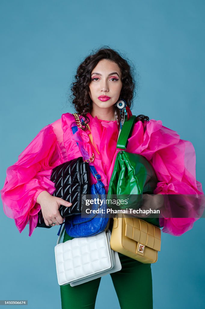 Woman with many purses