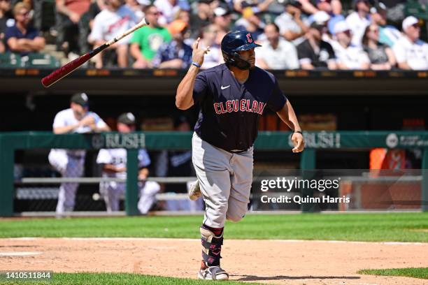 Josh Naylor of the Cleveland Guardians flips his bat after hitting a RBI single in the ninth inning against the Chicago White Sox during game one of...