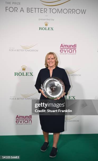 Award recipient Betsy King holds the trophy after being awarded the Rolex prize for a better tomorrow after day three of The Amundi Evian...