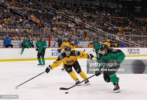 Mark Auk of Team Murphy attempts to move past Kevin Fitzgerald of Team Mullen during 3ICE Week Six at PPG PAINTS Arena on July 23, 2022 in...