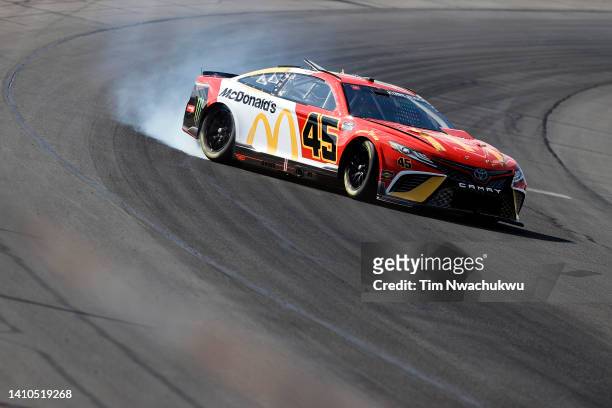 Kurt Busch, driver of the McDonald's Toyota, spins after an on-track incident during qualifying for the NASCAR Cup Series M&M's Fan Appreciation 400...